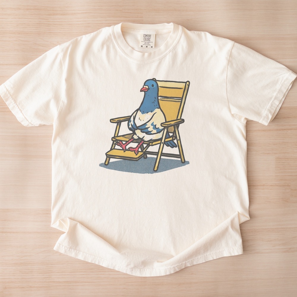 Grumpy Pigeon Lounging on a Beach Chair Tee